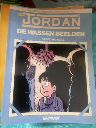Cover van De wassen beelden