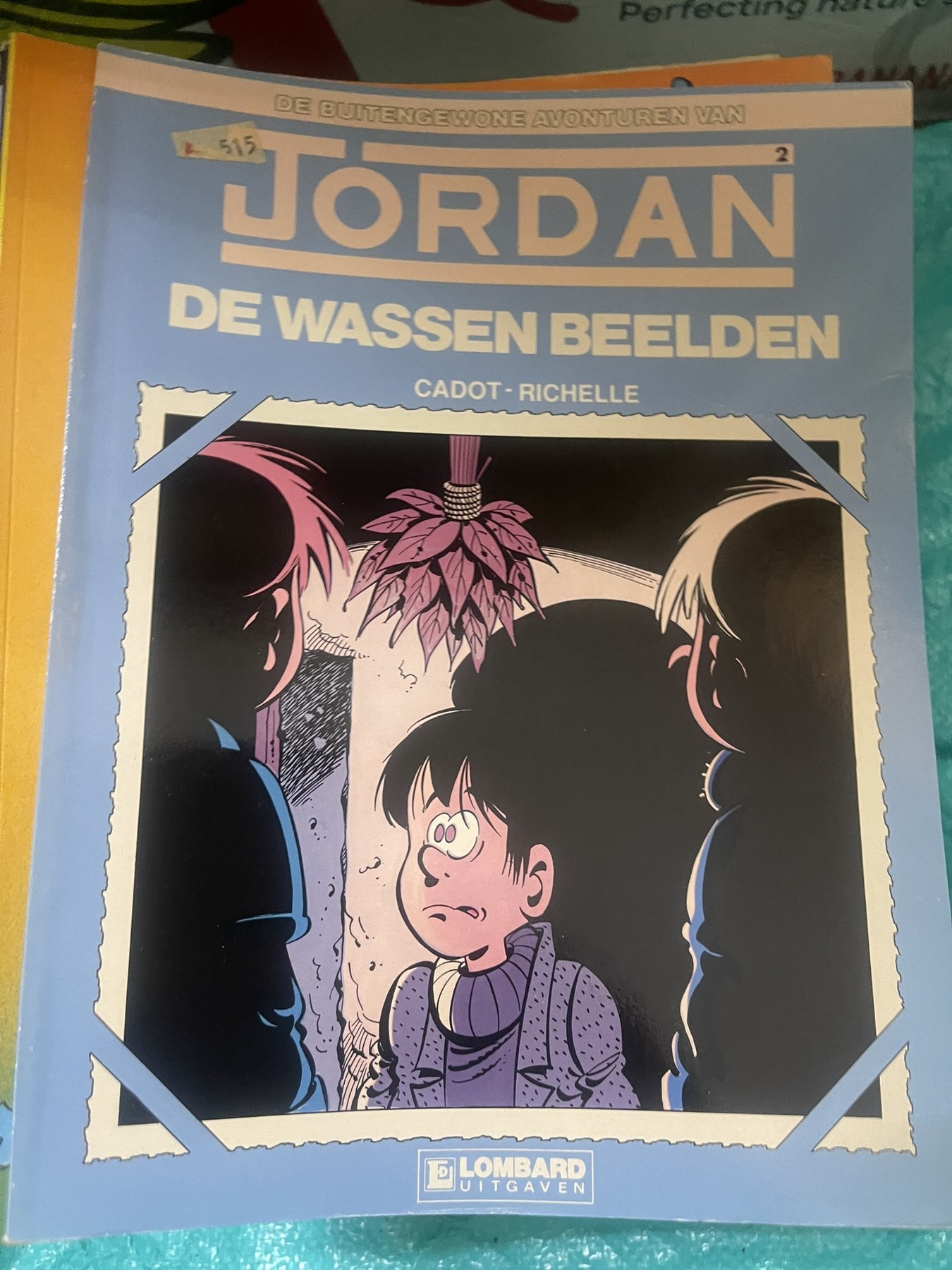 Cover van De wassen beelden