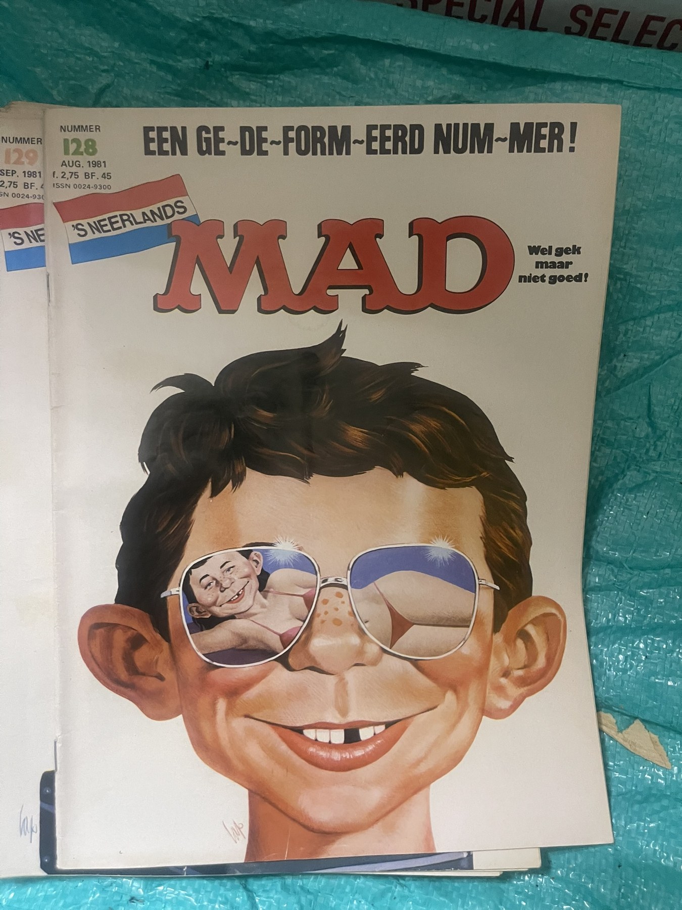 Cover van Mad 128