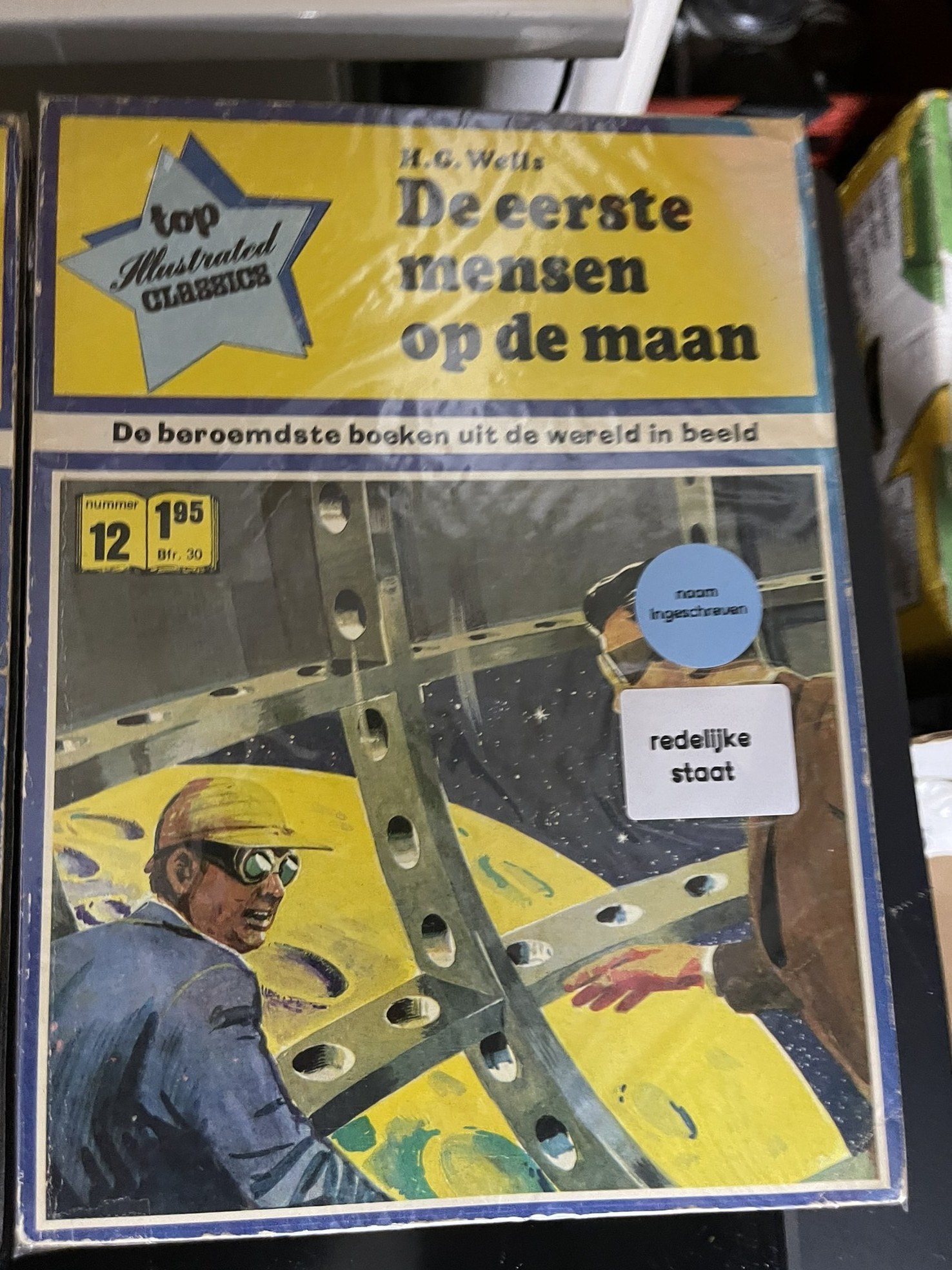 Cover van De eerste mensen op de maan