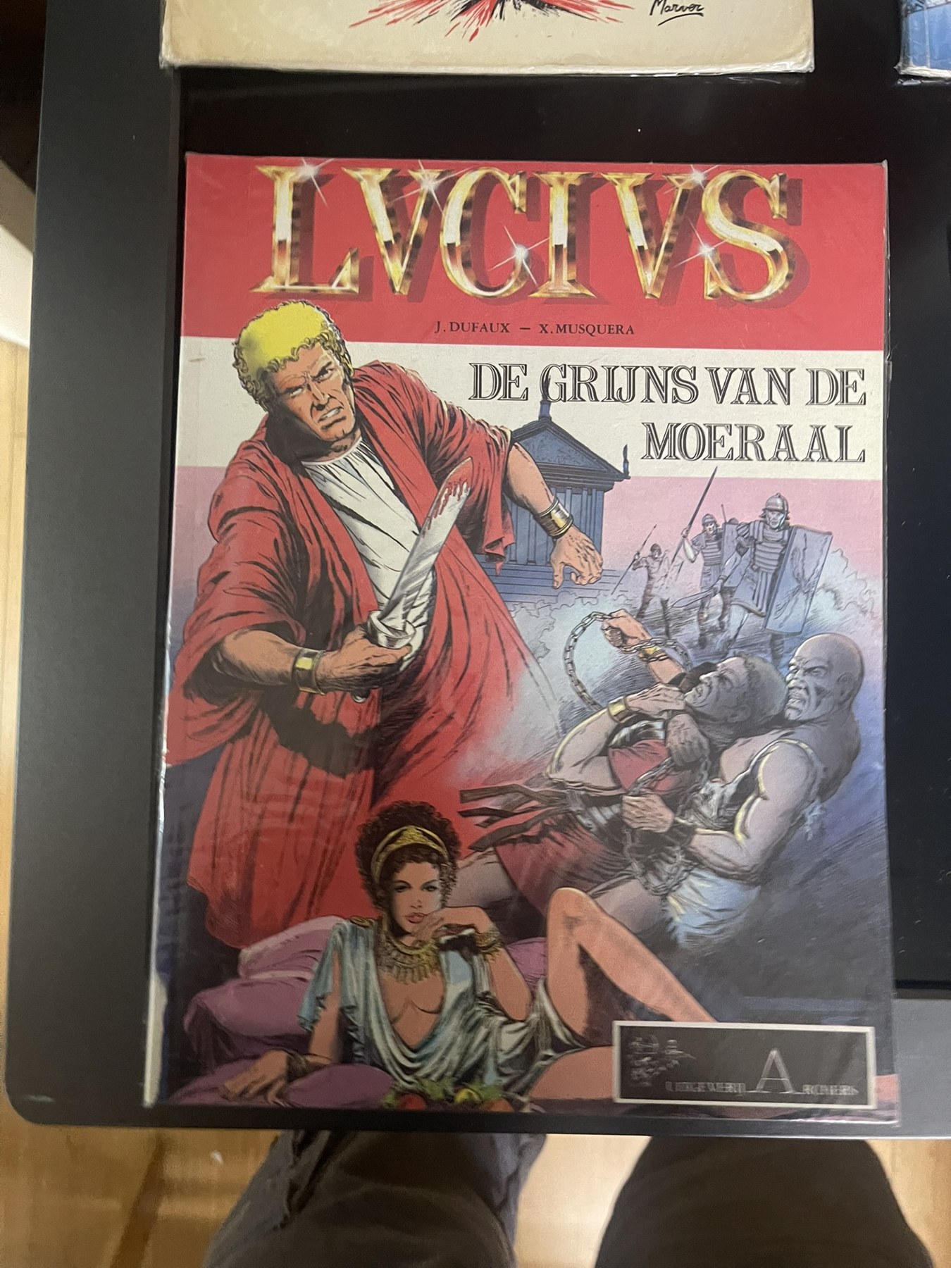 Cover van De grijns van de moeraal