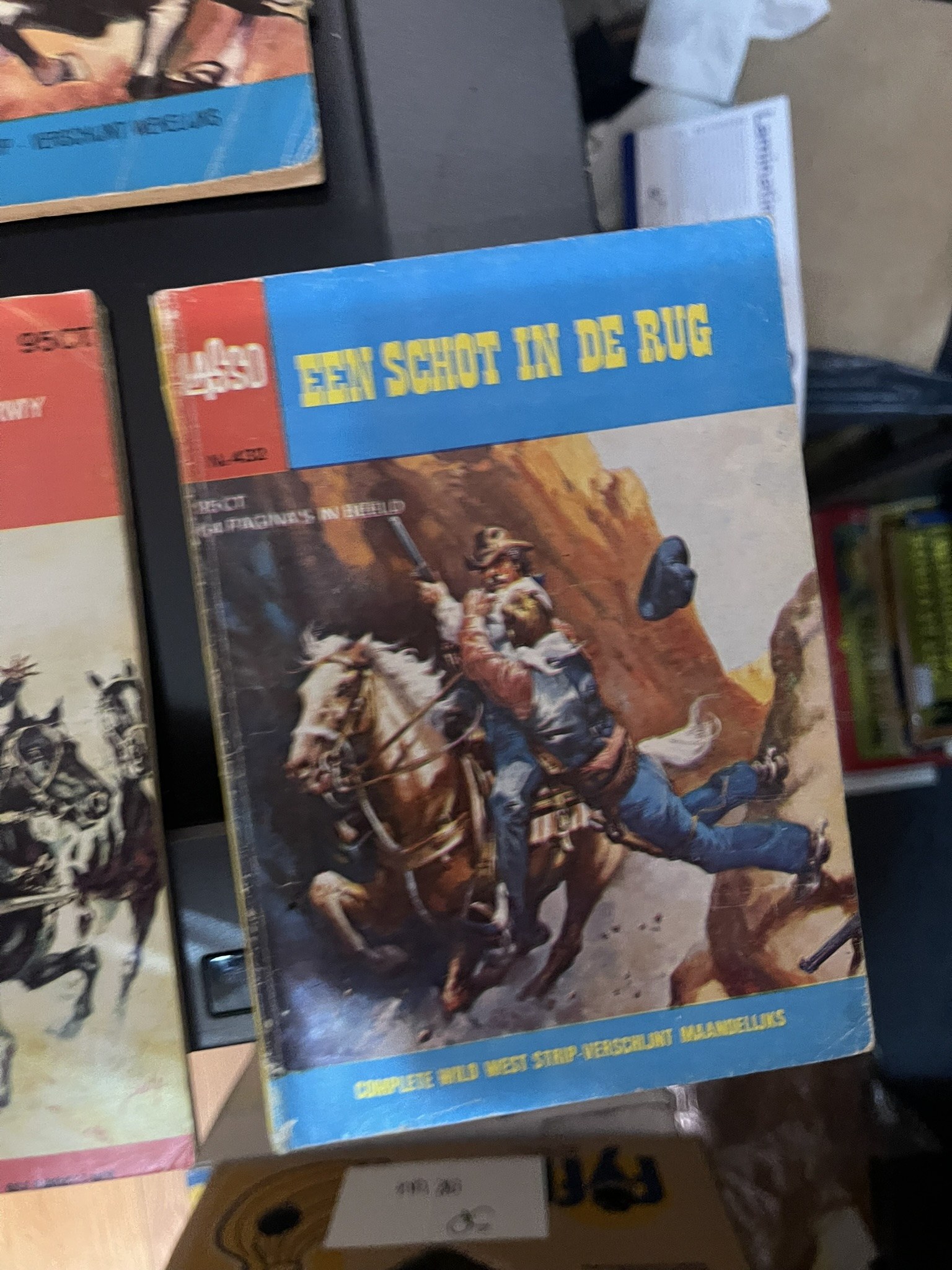 Een schot in de rug