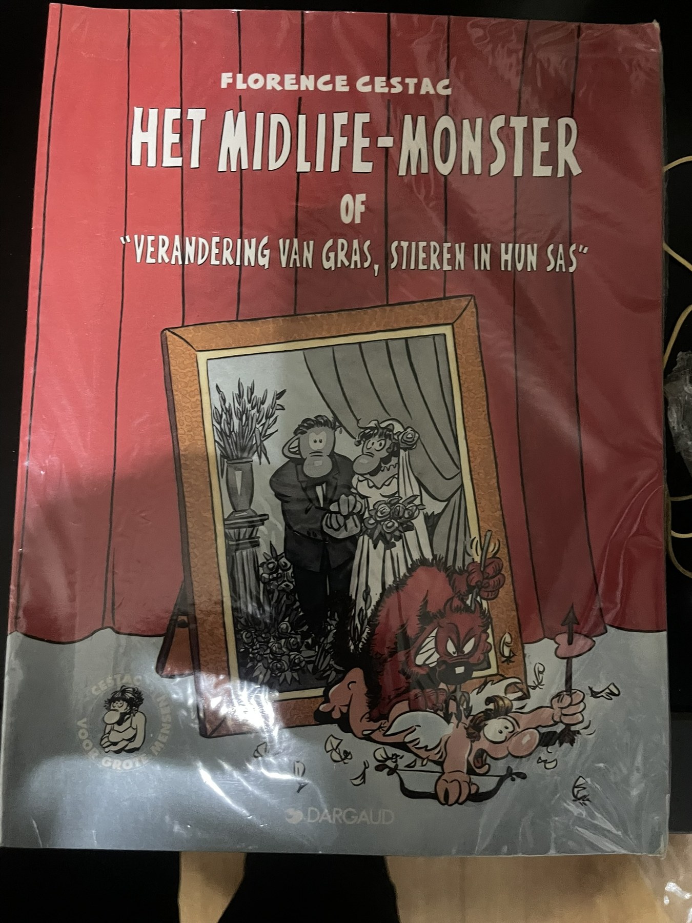 Cover van Het Midlife-Monster of "Verandering van gras, stieren in hun sas"