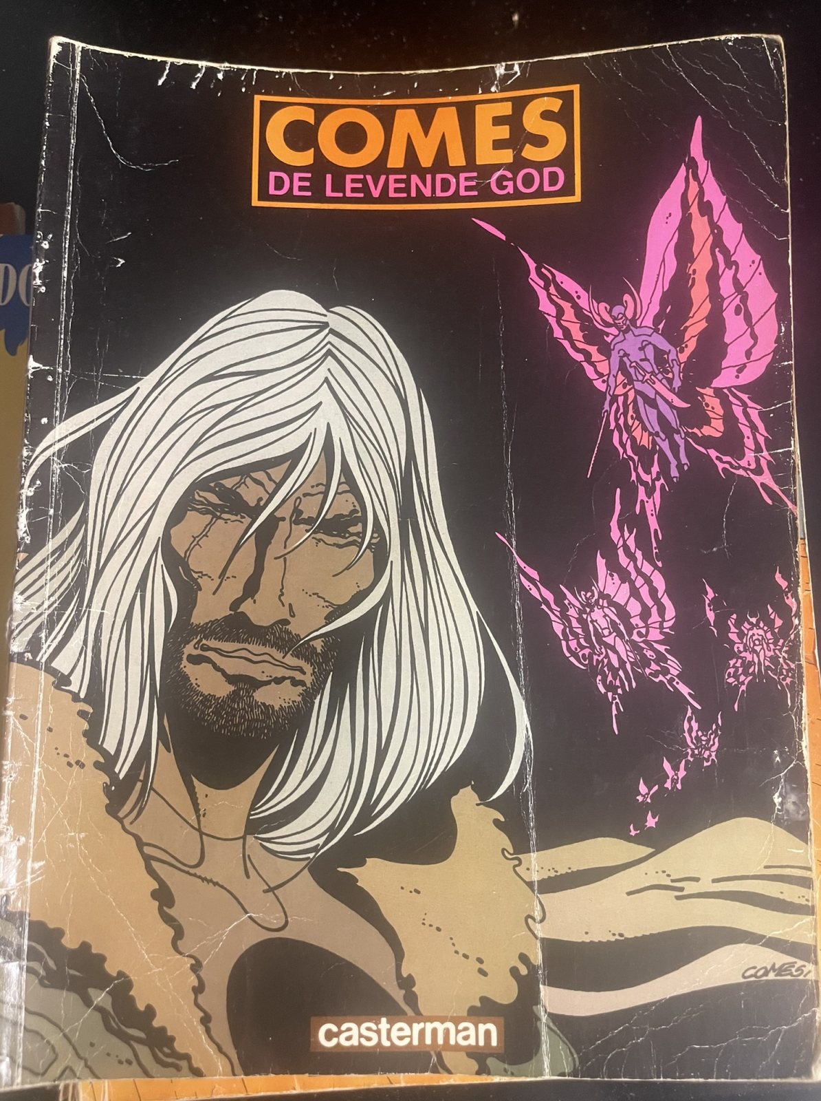 Comes - De levende god