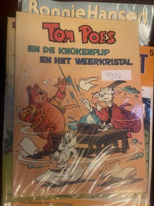 Cover van Tom Poes en de knokenpijp + Tom Poes en het weerkristal