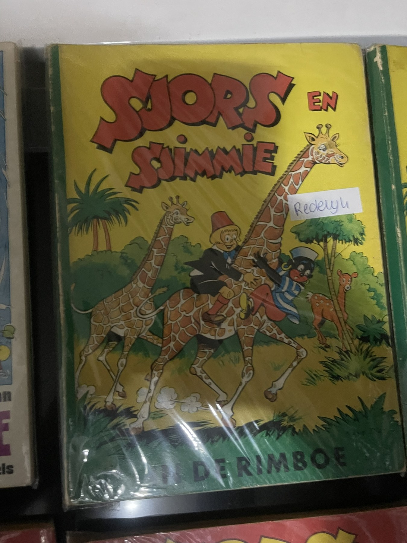 Cover van Sjors en Sjimmie in de rimboe