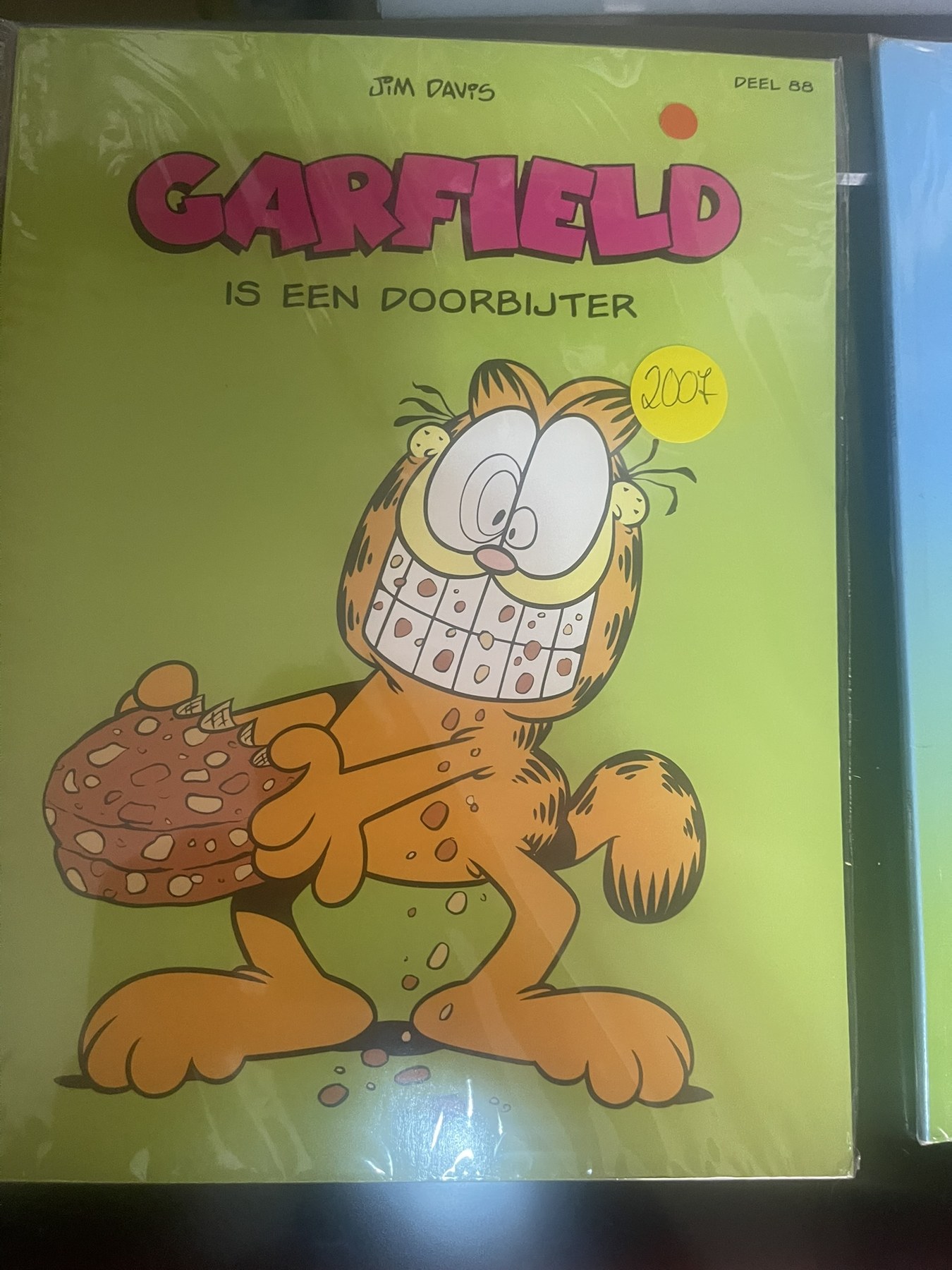Cover van Garfield is een doorbijter