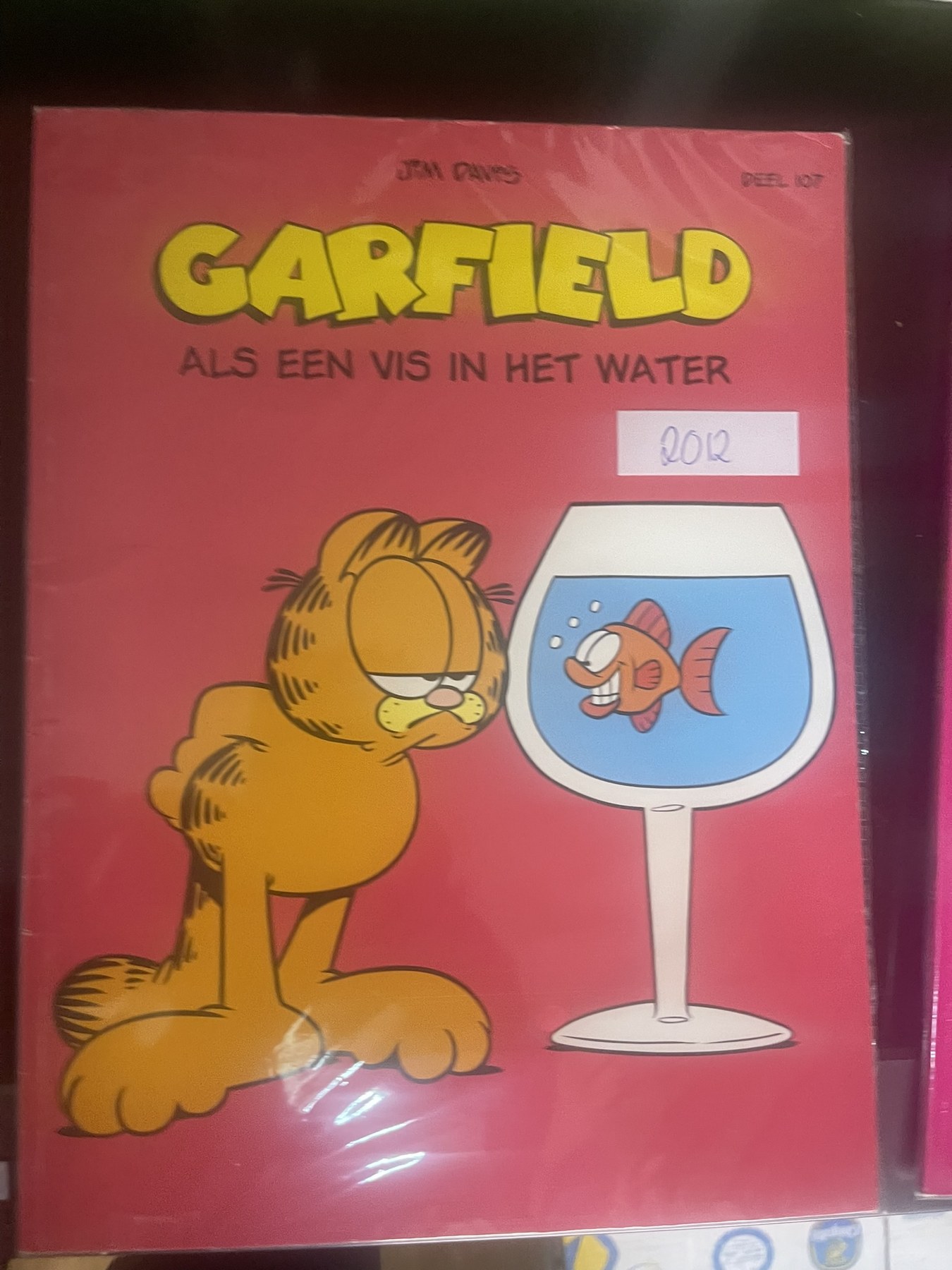 Cover van Garfield als een vis in het water