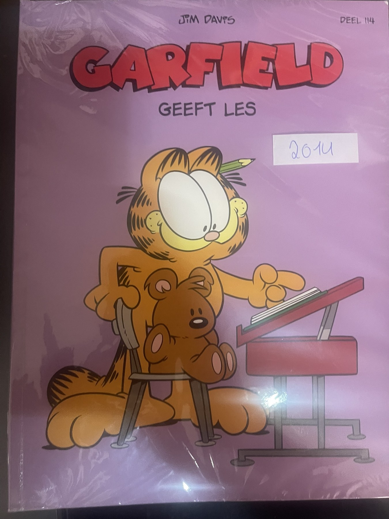 Cover van Garfield geeft les