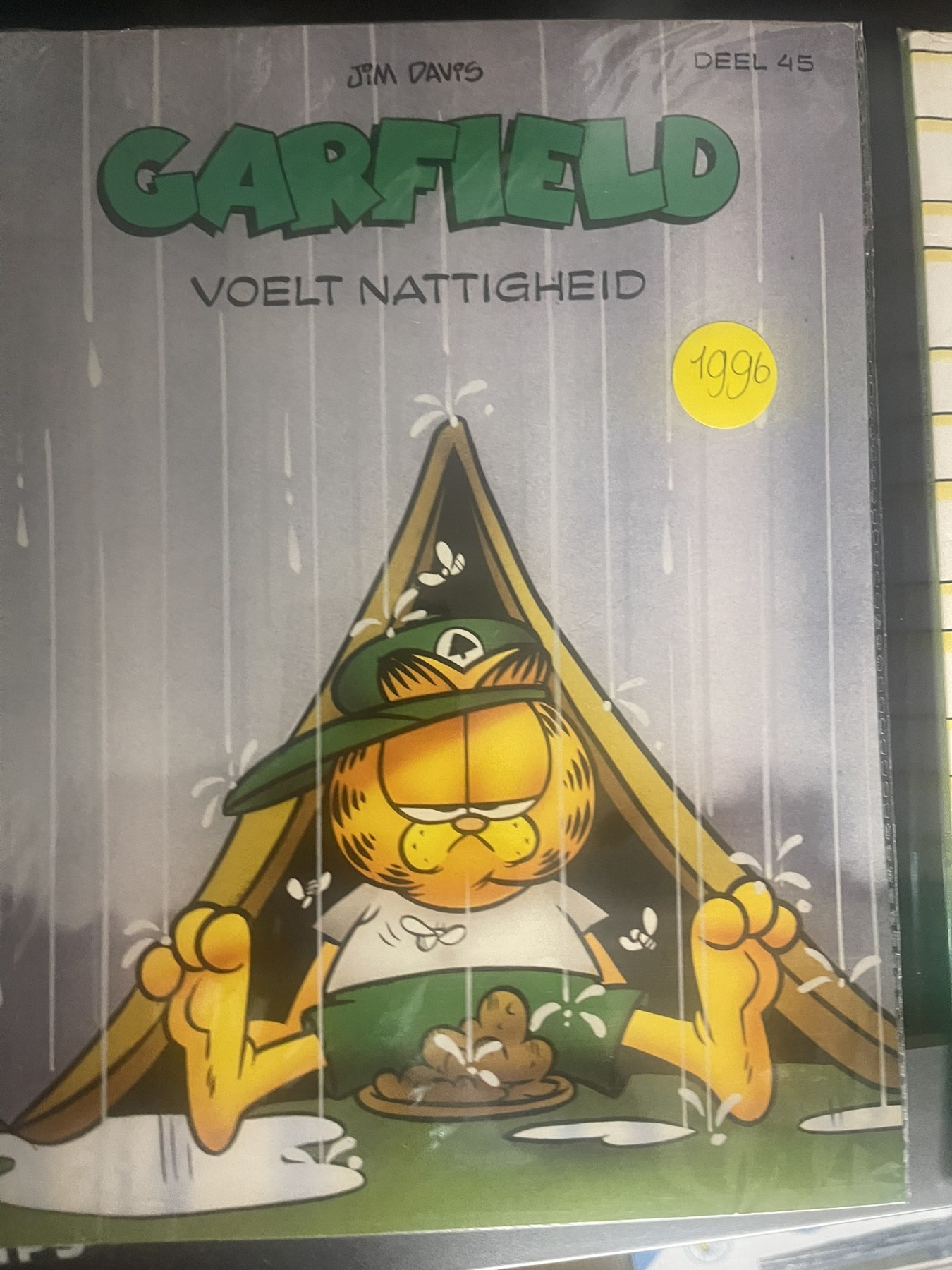 Cover van Garfield voelt nattigheid