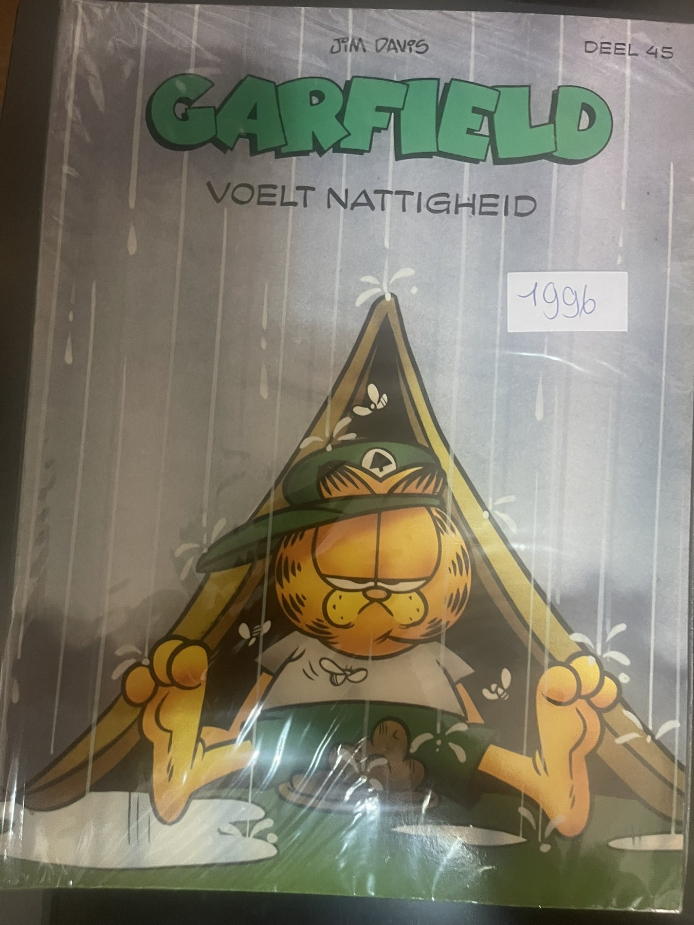 Cover van Garfield voelt nattigheid